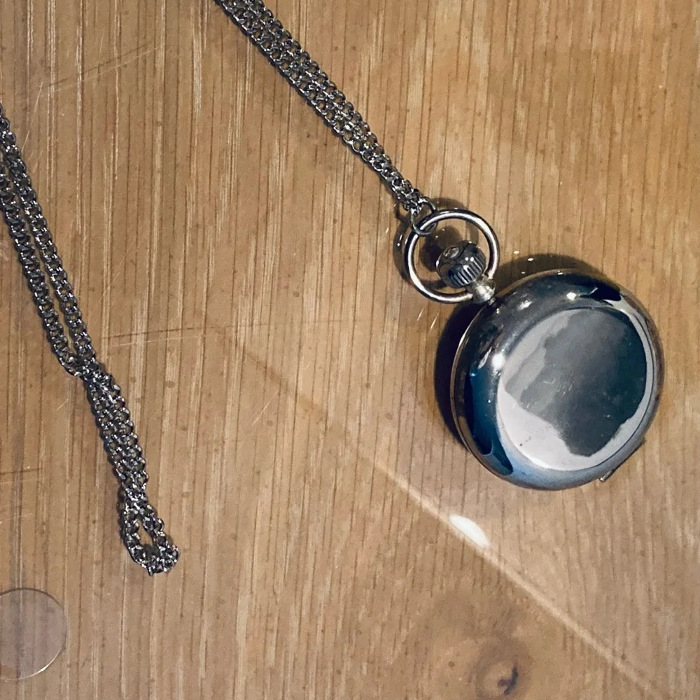 Estee Lauder pocket watch